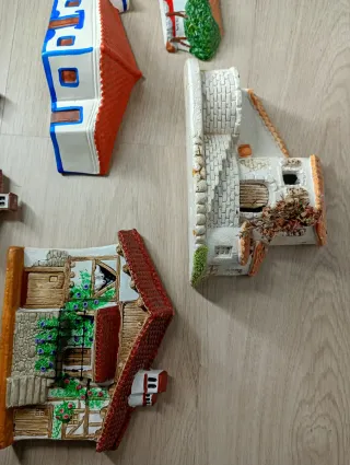 Casas de cerámica para pared