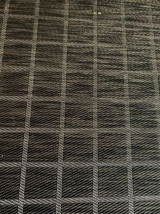 Tappeto a quadretti tessuto