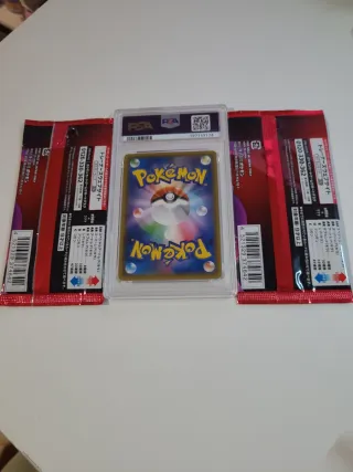 PSA 10 Eevee & Snorlax GX + 2 sobres Pokémon