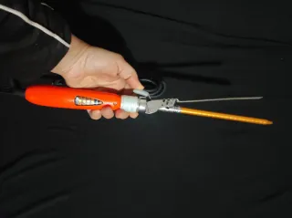 Ferro arricciacapelli arancione e argento