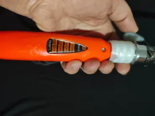 Ferro arricciacapelli arancione e argento