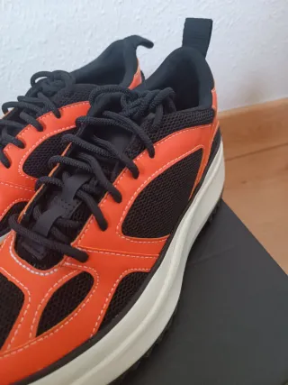 Zapatillas Converse Naranja y Negro