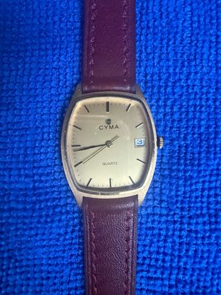 Reloj Cyma Cuarzo oro.