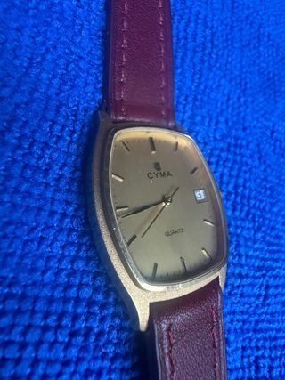 Reloj Cyma Cuarzo oro.