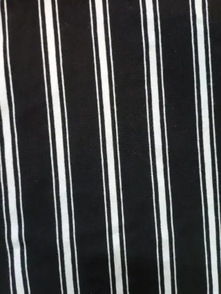 Mono largo de tirantes a rayas