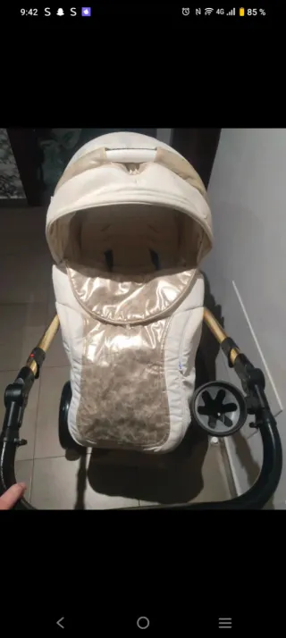 Carro bebe dorado TORAL,con silla de paseo y capaz