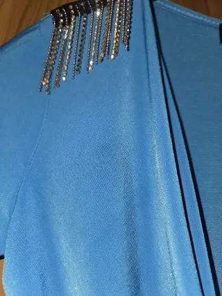 Body blu con frange sulle spalle