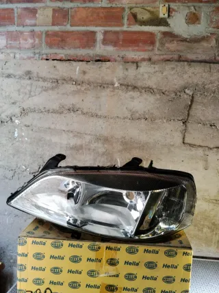 Faro Izquierdo Opel Astra Hella