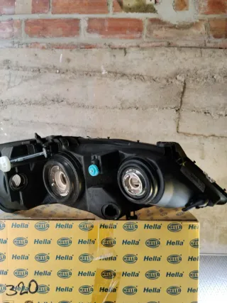 Faro Izquierdo Opel Astra Hella