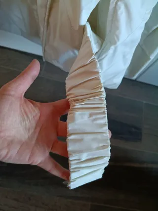 Piumino bianco con cappuccio e pelliccia