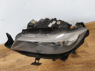 Faro Izquierdo BMW E90 Xenon con lavafaros