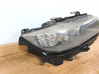 Faro Derecho BMW E90 Xenon con Lavafaros