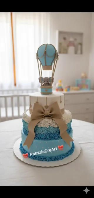 Torta scenografica 3 piani elefante mongolfiera