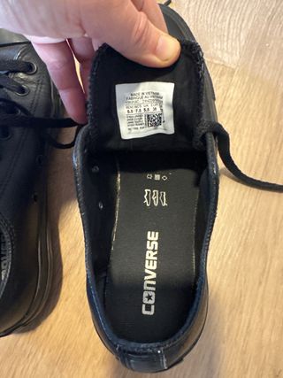 Converse All Star 38 de cuero negro.