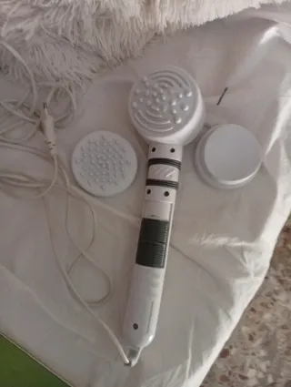 Aparato de masaje eléctrico blanco