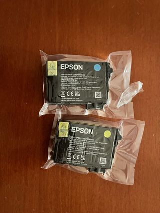 Cartuchos Tinta Epson azul , amarillo y 3 negros