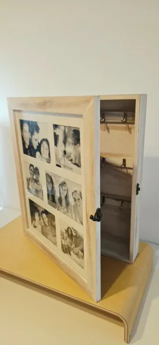 Marco de fotos con joyero