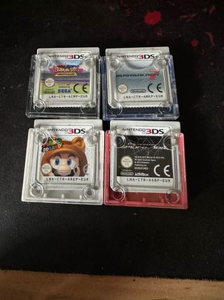 Nintendo 3ds XL blanca y 4 juegos