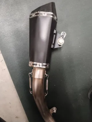 Tubo escape moto 125