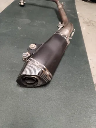 Tubo escape moto 125