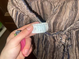 Pantalone beige a righe e riquadri