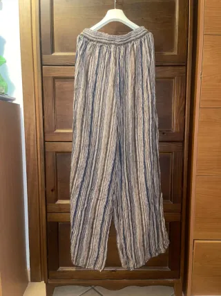 Pantalone beige a righe e riquadri