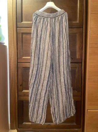 Pantalone beige a righe e riquadri