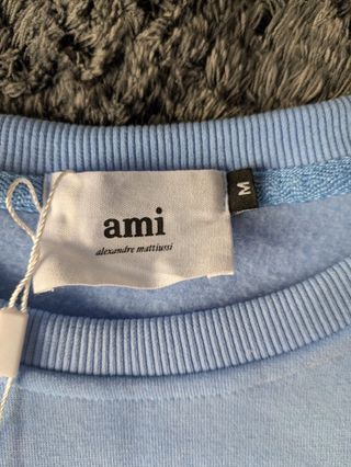 Sudadera AMI Paris azul claro con corazón