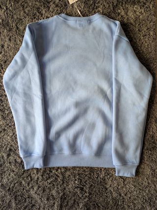 Sudadera AMI Paris azul claro con corazón