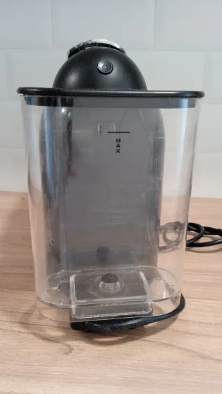 Cafetera Delta Q + Cápsulas