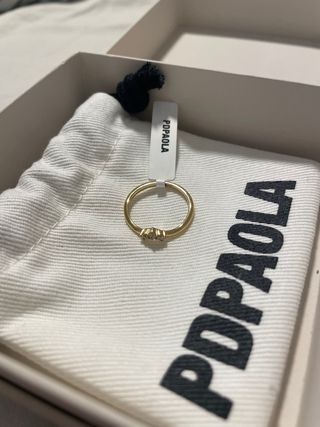 Anillo color oro con diamantes