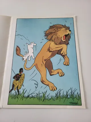 Album  con 7 laminas de Tintín.1987