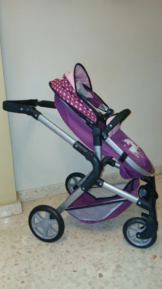 Cochecito de muñecas. Silla de paseo.