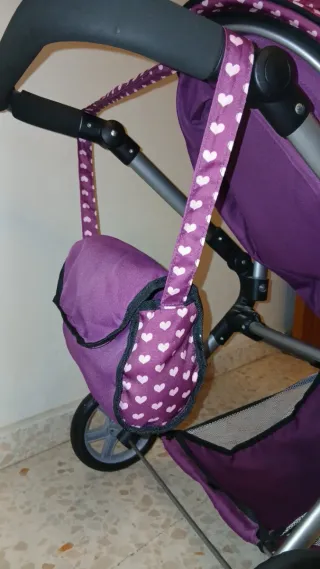 Cochecito de muñecas. Silla de paseo.