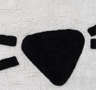Alfombra en forma de gato nueva!