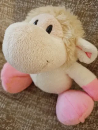 Peluche beige suave como nuevo