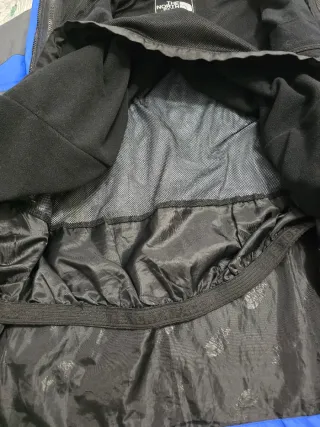 The North Face impermeable azul y gris oscuro