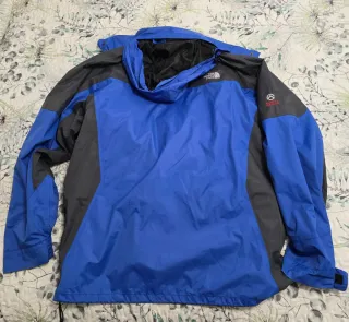 The North Face impermeable azul y gris oscuro