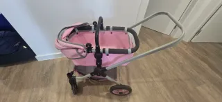 Carrito de muñecas rosa lunares