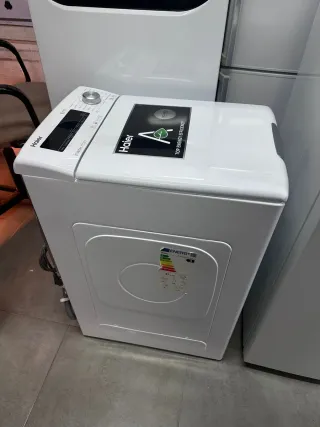 Lavadora carga soprior Haier 8kg con garantia tran