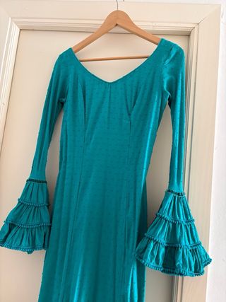 Traje de flamenca verde con volantes