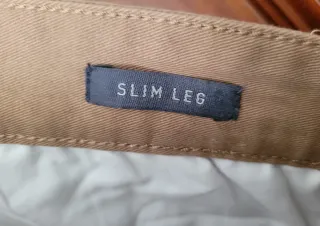 PANTALONES NEGRO Y BEIGE HOMBRE C&A.