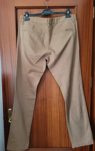 PANTALONES NEGRO Y BEIGE HOMBRE C&A.