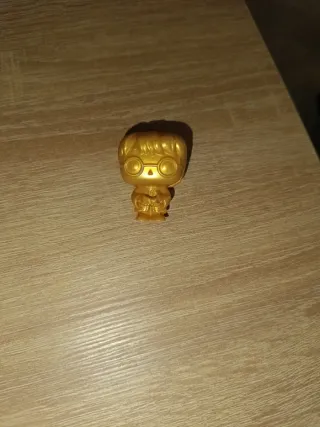 Muñeco Harry Potter Dorado