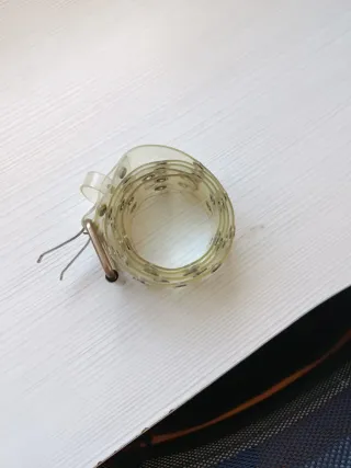 Cinturón transparente