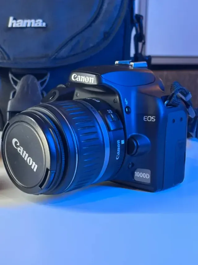 IMPECABLE Canon EOS 1000D