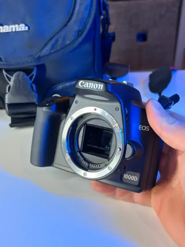 IMPECABLE Canon EOS 1000D