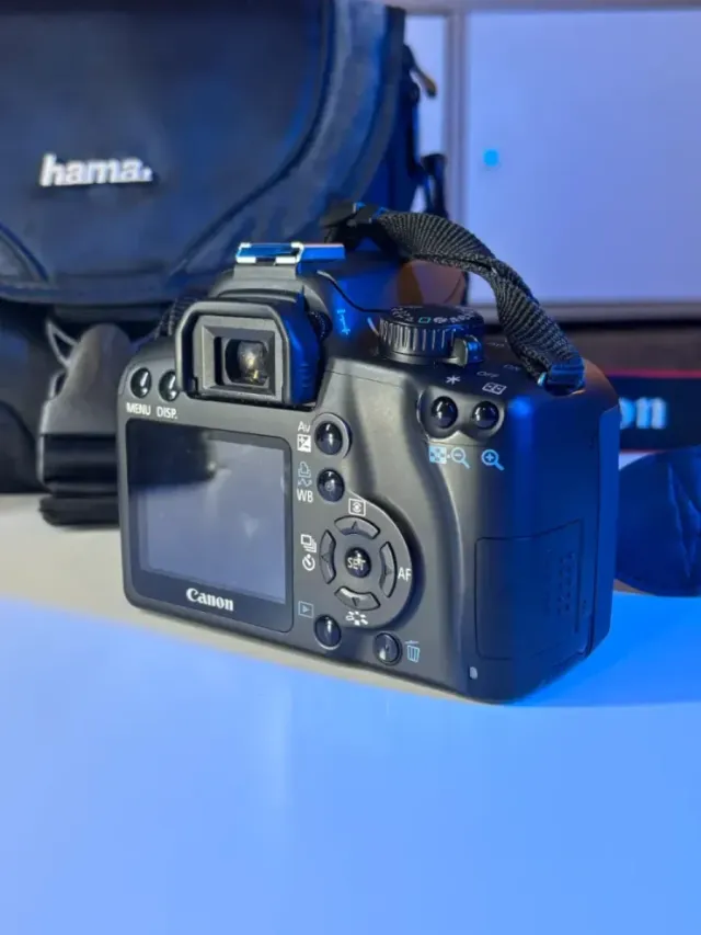 IMPECABLE Canon EOS 1000D