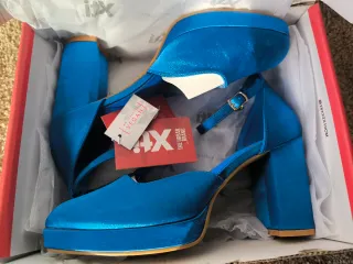 Zapatos de plataforma azules de Xti