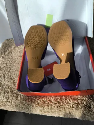 Zapatos de plataforma violetas de Xti